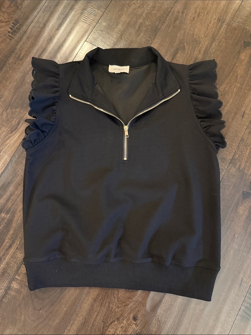 Umgee Black Sleeveless Zip Polo with Ruffle Sleeves